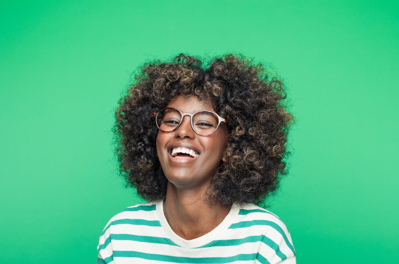 A woman is happy about getting help for a VAT Bill
